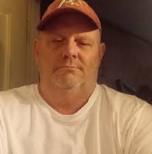 Someone is scamming George strait page !!!