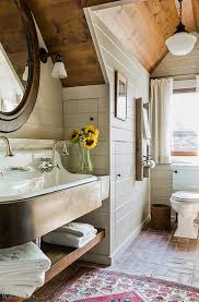 Here's another attic bathroom example from georgian design that shows just how much you can make those beams stand out by painting the other painting the walls white or cream really brings out the richness of the wood above. 15 Attics Turned Into Breathtaking Bathrooms