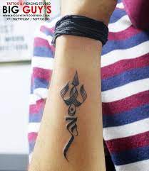 Trishul Tattoo Along With Om Tattoo Done By Us Big Guys Tattoo Trishul Tattoo Tattoos For Guys Trishul Tattoo Designs