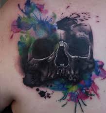 A splattering of soft colors forms a pretty, feminine, and creative skull tattoo! I Too Have Done Some Watercolor Skulls Tattoo