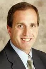 Former Gopher coach named to football staff