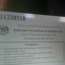 Identifikasi kad pengenalan sementara dipapar di sudut atas. Jabatan Pendaftaran Negara Kuala Kubu Bharu Kuala Kubu Baharu Selangor