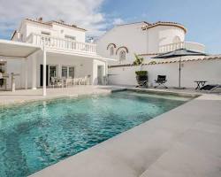 Private swimming pool villa in Empuriabrava, Costa Brava, generated by AI