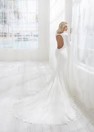 On the off chance that you have hips that are either too full or too little, you might need to attract eyes to your chest and arms. Fitted Simple Long Sleeve Wedding Dress With Open Back Kleinfeld Bridal