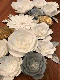 Yinva gold and white party decorations 8 pcs paper fan flowers 20 pcs confetti balloons pennant banner 15 pcs tissue paper tassels garland birthday party supplies for wedding baby shower decorations. Paper Flower Backdrop White Gold And Silver Paper Flower Backdrop White Paper Flowers Paper Flowers