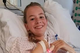 Referee, 19, 'winded' when a football was booted into her stomach left 'on  the brink of death'