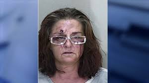Mug Alert: Florida Woman Arrested For Animal Cruelty After Pouring Hot  Sauce In Fish Tank