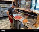 Professional pizza chef at La Strada Pizza Restaurant in Brooklyn ...