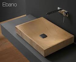 Wooden bathroom sinks come in a wide range of types of wood, each one can be finished and shaped in a number of ways to create a unique look every time. Ebano Wooden Bathroom Sink Modern Home Decor Modern Bathroom Sink Wooden Bathroom Sink Design
