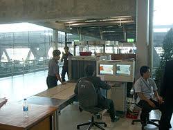 Saran wrap is plastic, and since plastic isn't metal, the metal detector won't react to it at all. Airport Security Wikipedia