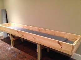 Each player gets five balls to arrange however they want at their end of the table, and they take turns trying to knock each other's balls into troughs at each end of the table. Pin On Projects