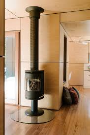 Check spelling or type a new query. Photo 36 Of 254 In Living Light Hardwood Wood Burning Photos From Three Shipping Containers Form A Tiny Eco Friendly Home In Australia Dwell