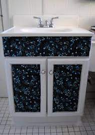 You can use it to glue paper or fabric, to a box, or frame. Design On A Nickel Bathroom Cabinet Decoupage Restyle Bathroom Cabinet Makeover Rustic Bathroom Shelves Bathroom Interior Design