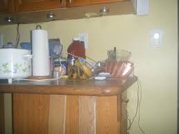 After applying the adhesive, carefully lower each quartz slab. How Do I Attach This Countertop To The Wall And Or Base Cabinets Doityourself Com Community Forums