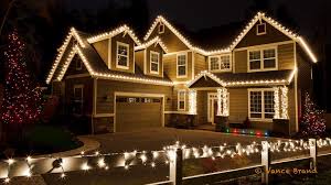 C9 Lights Decorate The House While The Fence Is Wrapped With Mini Lights Christmas House Lights Outdoor Christmas Lights Roof Christmas Lights