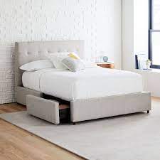 Here is a bed with similar design, however instead of diamond tuft details it has channel tufting. Grid Tufted Storage Bed