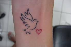 Can you use dove cream on a tattoo : Espirito Santo Tattoo Designs Wrist Dove Tattoo Design Dove Tattoo Designs