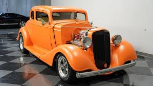 Image result for Omaha Orange 1934 GMC