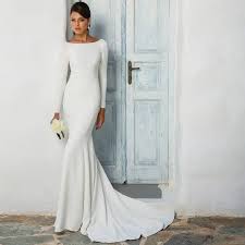 Look Like Royalty In This Clean And Sophisticated Wedding Day Look Wedding Dress By Justinalex Wedding Dress Long Sleeve Wedding Dress Styles Wedding Dresses