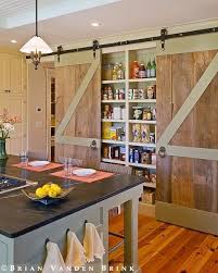 Looking for barn doors with track like a sliding closet door for 72 in wide door don't have a wall on the sides need it to slide like a glass sliding door. A Pantry With A Barn Door Home Kitchens Shallow Pantry Barn Door Pantry