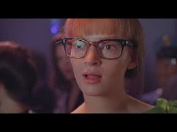 Poison Ivy seduces Commissioner Gordon