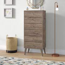 It measures 37.75 tall, so you can use the top of this dresser chest to keep. Tall Dressers Wayfair