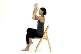 10 Yoga Poses You Can Do In A Chair Chair Yoga Chair Pose Yoga Yoga Information