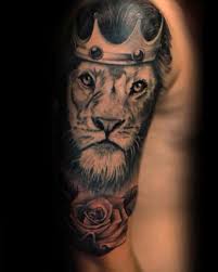 When it comes to tribal designs, they are very easily made, because the lines of a lion's body are easily transformed into tribal art. 50 Lion With Crown Tattoo Designs For Men Royal Ink Ideas