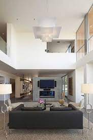 In definition, the term minimalist means it means, with minimalism you can create a comfortable living in a limited space. Lounge And Mezzanine High Ceiling Living Room Minimalist Living Room Contemporary Living Room Design
