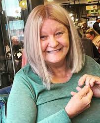 This is my friends late mother who passed away a few days ago, I want to  have a clock personalised for her but want a slightly better photo. Could  someone remove all