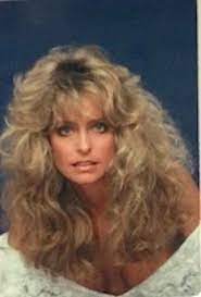 Crimped hair was popular in the early and mid 2000s. Farrah Fawcett Had The Most Beautiful Hair Of Anyone In The 80 S I M Serious Farrah Fawcett Farrah Fawcet Hairstyle