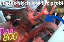 Ford 800 lets pull off the rear top plate and see why the 3pt hitch wont  lift high enough