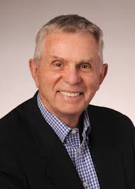 Straining to praise President Trump