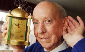 39574233-Sound timepiece. . . Arnold Brackpool with a Metamec clock which  plays an Arabic recording. . . . copy Rachel Banham EDP Sunday. . . contact  David Scottow 01362 693595 edp sun 1. 2. 03