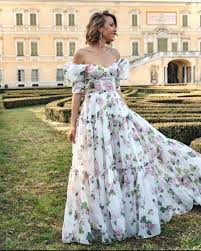 White wedding dress with colored flowers. Floral Wedding Dresses For Brides That Are Pretty