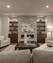 Play with patterns by layering an area rug or two on the floor, and keep an acrylic coffee table on top of it to let the textile stay in the spotlight. 101 Beautiful Living Rooms With Fireplaces Of All Types Photos Page 6 Home Stratosphere