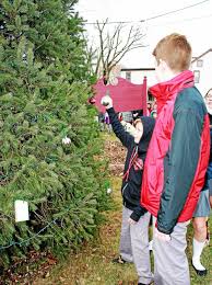 St. Francis Academy tree lighting honors 90-year-old alumni
