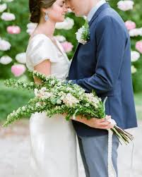This purple long stem bouquet of roses and calla lilies is from a rooftop wedding. 0hqz88wdskrtxm