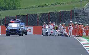 Medical officers evacuate swiss moto3 rider jason dupasquier after a crash during a qualifying session of the italian grand prix at the mugello race track. 94vnsv4 Chzf6m
