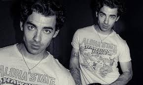 Joe Jonas proudly wears his wedding band in new Labor Day Instagram post...  after claims he and wife Sophie Turner have 'marital troubles'