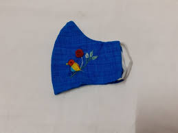 Machine embroidering letters with a zig zag sewing machine; Hand Embroidery Mask Kolkata
