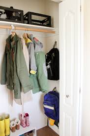 This clever idea quadruples the storage possibilities in a tiny coat closet. Coat Closet Organization
