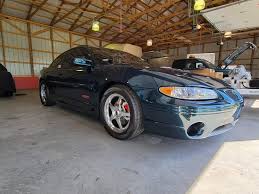 Image result for Dark Tropic Teal 2004 Pontiac