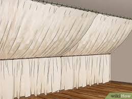 Decorate a very slanted wall in the living room. 3 Ways To Decorate Slanted Walls Wikihow