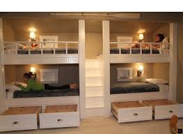This immense dark stained wood frame bunk bed features the perpendicular lower bunk design, built on casters for. Pin On Beautiful Bunk Bed Designs
