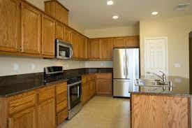 I recommended that they paint the walls a creamy white or pale gold, which would other paint colors that would look beautiful with honey oak wood trim are warm grays with green or bronze undertones. Paint Color Advice For A Kitchen With Oak Cabinets Thriftyfun