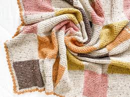 This stunning comfort knitted patch blanket is the perfect throw to cuddle up under and read a good book or watch tv. Tl Yarn Crafts The Pilson Blanket A Modern Patchwork Crochet Baby Blanket Tl Yarn Crafts