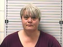 Woman who stole checks in past charged with theft