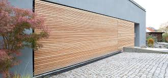 Flachenbundige Tore Fur Eine Einheitliche Optik Garagentore Garagentor Moderne Garage