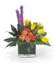 Author chelsea fuss shows how to make floral arrangements with foraged and seasonal greenery, branches, and flowers. Contemporary Expressions At From You Flowers White Flower Arrangements Tropical Flower Arrangements Contemporary Flower Arrangements